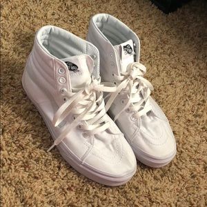 White high top vans.